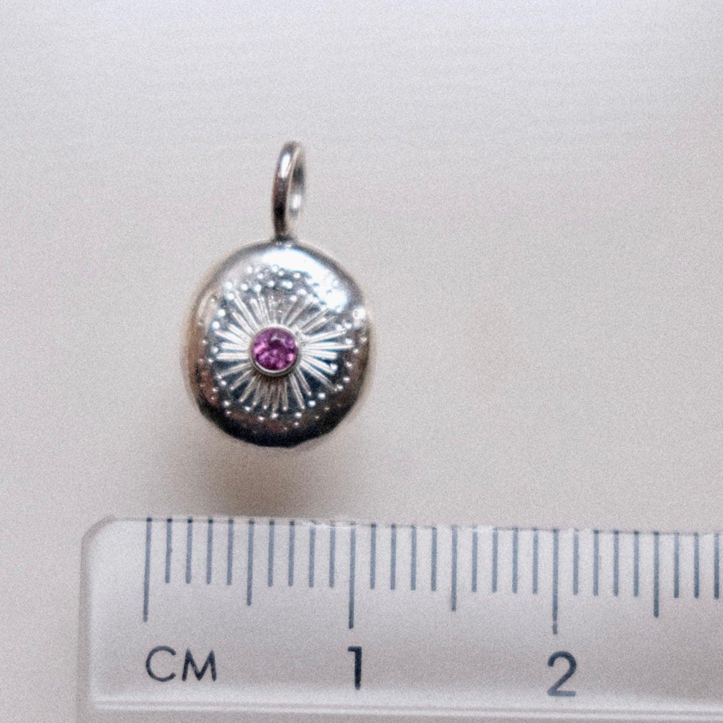 Dainty Rhodolite Garnet Starburst Pendant