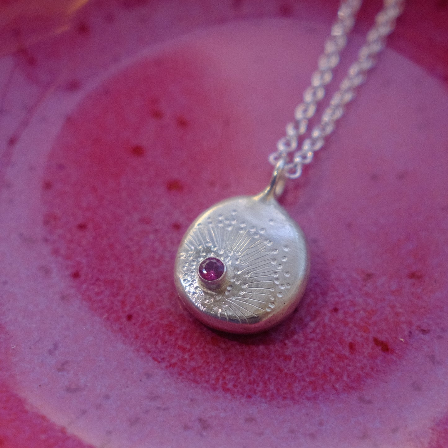 Garnet Facet Starburst Pendant
