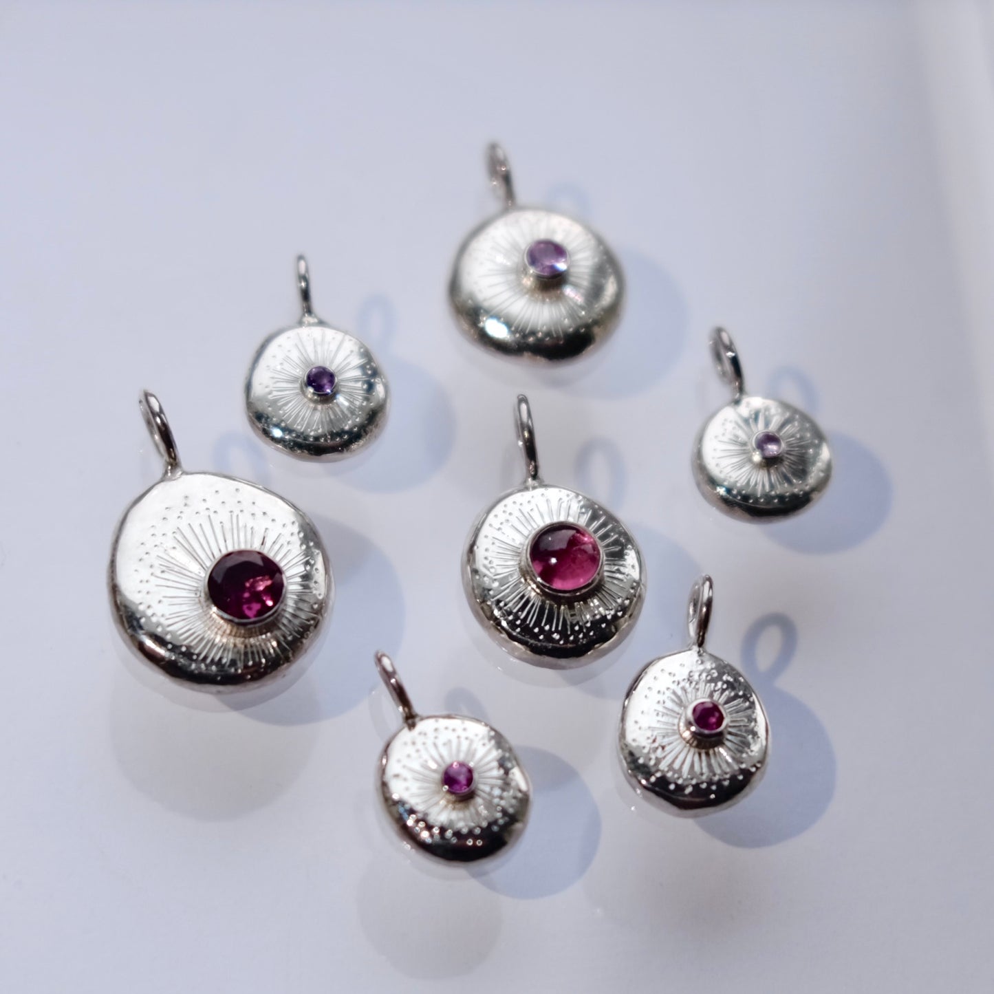 Rhodolite Garnet Facet Starburst Pendant