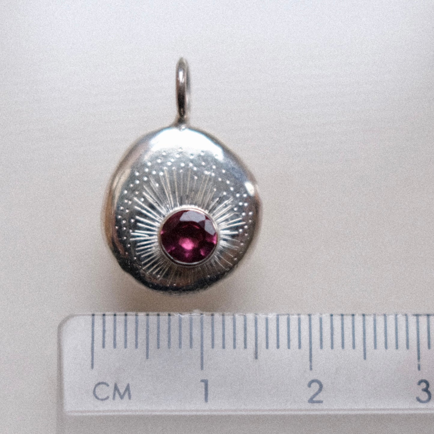 Rhodolite Garnet Facet Starburst Pendant